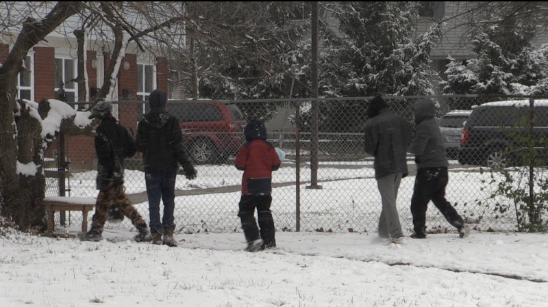 The Thames Valley Education Foundation Caring Fund helps between 400 and 500 families every year. Students are seen playing in the snow in London, Ont. on Tuesday, Nov. 17, 2020. (Bryan Bicknell / CTV News)