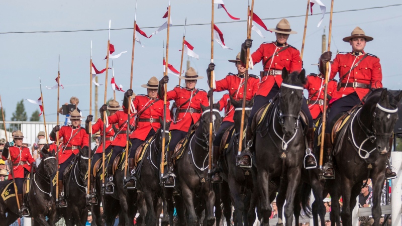 The Royal Canadian Mounted Police performing their musical ride during this week's International Ploughing Matches on September 23, 2016 in Harriston, Ontario, Canada. (Norm Betts / Barcroft Media via Getty Images)
