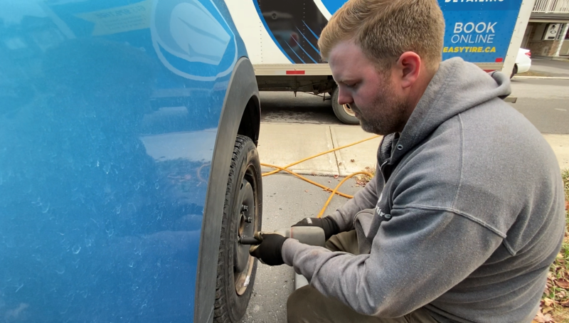 Michael Brown, Easy Tire co-owner, has seen a boom in business this year with his mobile, contactless tire change if service. Ottawa, ON. Nov. 20, 2020. (Tyler Fleming/CTV News Ottawa)