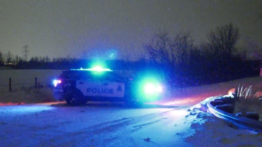 An Edmonton police cruiser blocks a road.