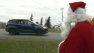 Residents had a chance to drive-by and see Santa in Harrowsmith, north of Kingston. (Kimberley Johnson/CTV News Ottawa)