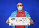 David Borges, 45, of Chatham shows off his earnings. (Courtesy OLG)