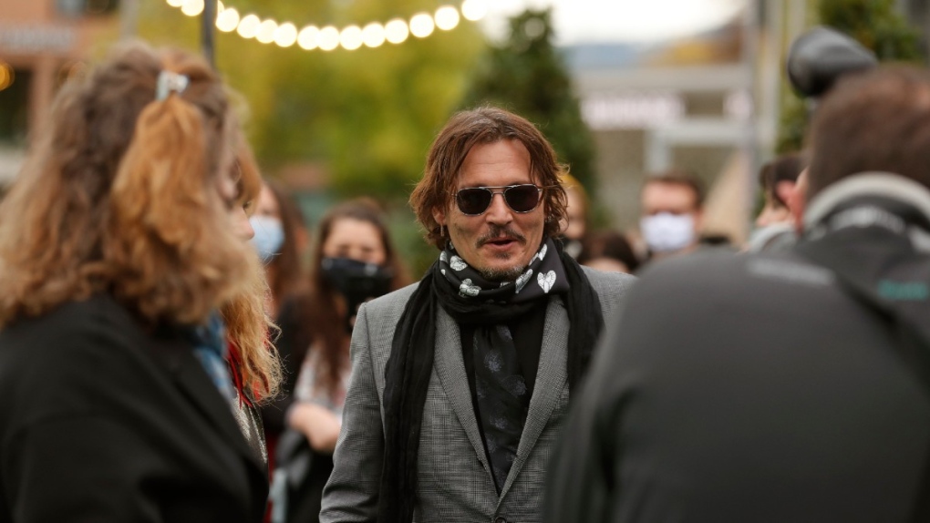 Johnny Depp, centre, in Zurich