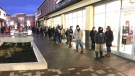 Shoppers lined up early at Tanger Outlets in Kanata for Black Friday sales. (Jim O'Grady/CTV News Ottawa)