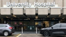 Vehicles are seen stopped outside the London Health Sciences Centre's University Hospital in London, Ont., Monday, Nov. 30, 2020. (Jim Knight / CTV News)
