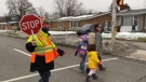 Crossing guard Eleanor Murnaghan is ensuring a safe crossing for students and parents heading to school. Ottawa, ON. Nov. 30, 2020. (Tyler Fleming / CTV News)