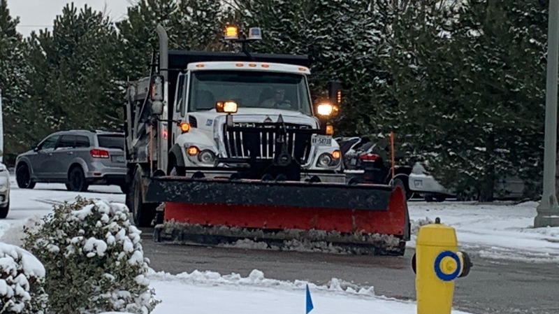 Snow plow cleans up in Windsor, Ont., on Tuesday, Dec. 1, 2020. (Rich Garton / CTV Windsor)