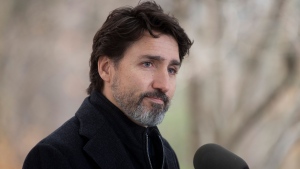 Prime Minister Justin Trudeau pauses after responding to a question about the holidays during a news conference outside Rideau Cottage in Ottawa, Friday, Nov. 20, 2020. THE CANADIAN PRESS/Adrian Wyld