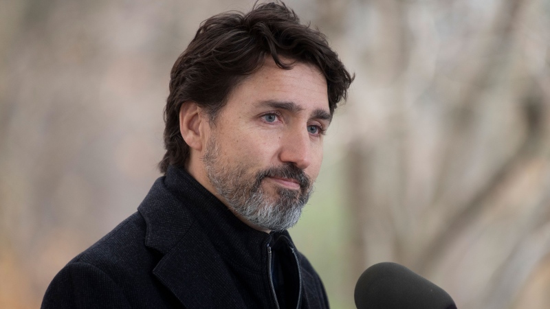 Prime Minister Justin Trudeau pauses after responding to a question about the holidays during a news conference outside Rideau Cottage in Ottawa, Friday, Nov. 20, 2020. THE CANADIAN PRESS/Adrian Wyld