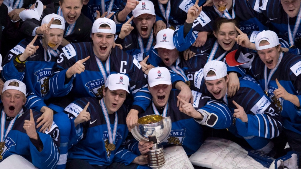 Team Finland celebrates their gold medal