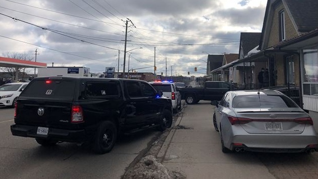London Ont. police surround a house on Adelaide Street North on Dec. 8, 2020. (Jordyn Read/CTV London)