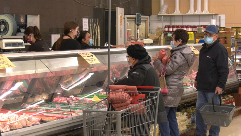 Shoppers at La Stella Grocery Store in Windsor, Ont. on Tuesday, Dec. 8, 2020. (Chris Campbell/CTV Windsor) 