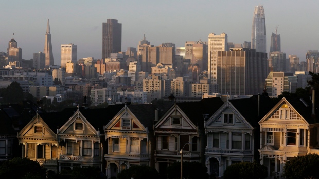 This July 11, 2017, file photo, shows the skyline beyond a row of Victorian houses in San Francisco. (AP Photo/Eric Risberg, File)