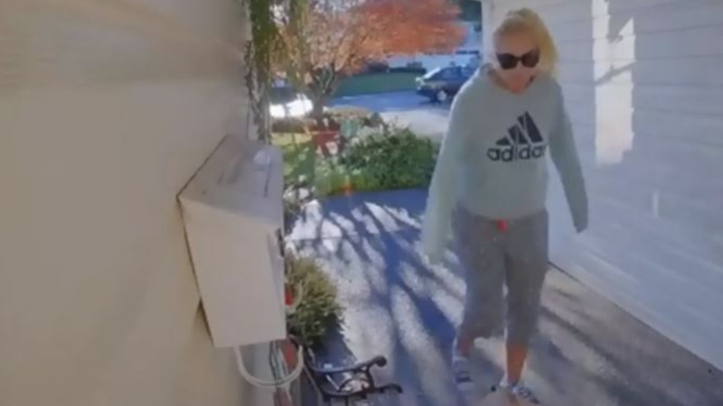 The Nanaimo RCMP released a video Thursday of a woman allegedly stealing a parcel from the front door of a home in central Nanaimo. (RCMP)
