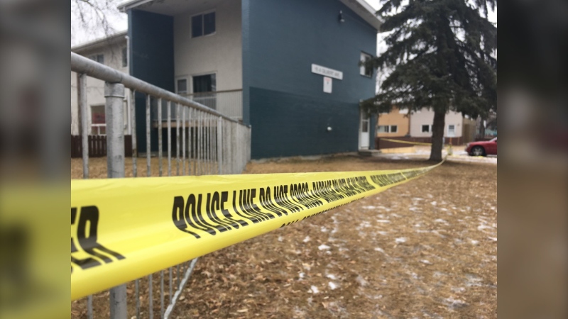 Police tape can be seen outside of a scene of a homicide near Gilbert Avenue on Dec. 11, 2020. (CTV News Photo Glenn Pismenny)