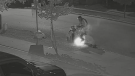 Police are trying to identify two people shown in this video of a garbage fire (Supplied: WRPS)