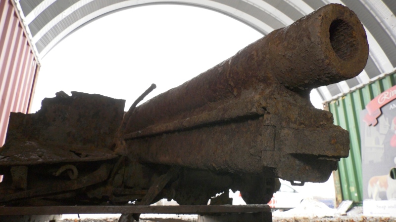 A rusted German 77 Field Gun is stored at a Town of Amherstburg site on Wednesday, December 16, 2020 after being dug up at a construction site in the town over the weekend. (Ricardo Veneza/CTV Windsor)