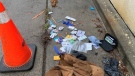 Drug paraphernalia is shown strewn on a  Cabbagetown street. A group of residents in Cabbagetown have resorted to hiring their own private security guard to patrol their neighbourhood amid concerns about crime in the area. 