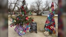Christmas trees decorated with, or made from, crocheted granny squares in Calabogie, in tribute to those who have died from COVID-19. (Dylan Dyson / CTV News Ottawa)