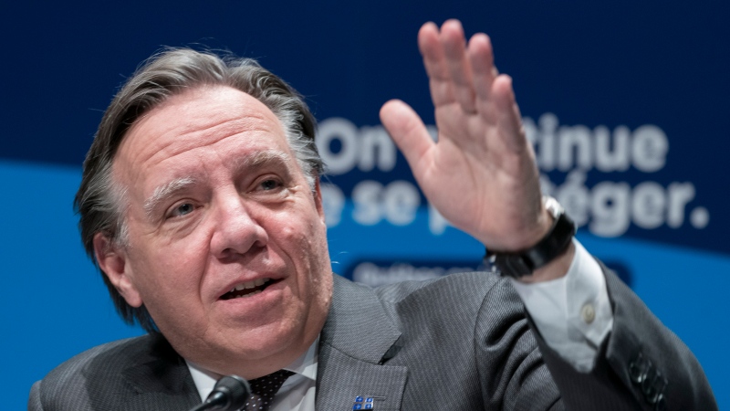 Quebec Premier Francois Legault responds to a question during a news conference in Montreal, on Tuesday, December 15, 2020. THE CANADIAN PRESS/Paul Chiasson