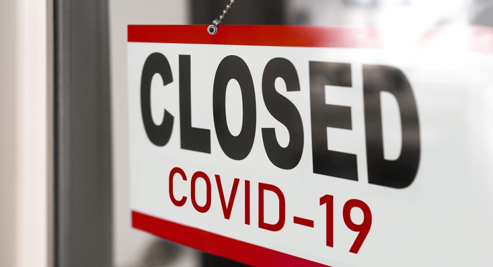 Closed due to COVID-19 sign