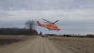 An Ornge helicopter airlifts a 34-year-old to hospital in Oxford County, Ont. on Wednesday, Dec. 23, 2020. (Source: @OPP_WR / Twitter)