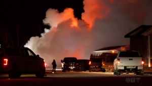 On Thursday evening, fire crews were seen battling a blaze at the Best Buy Homes business, about a kilometre west of Winnipeg, along the Trans-Canada Highway. (Jamie Dowsett/ CTV News Winnipeg)