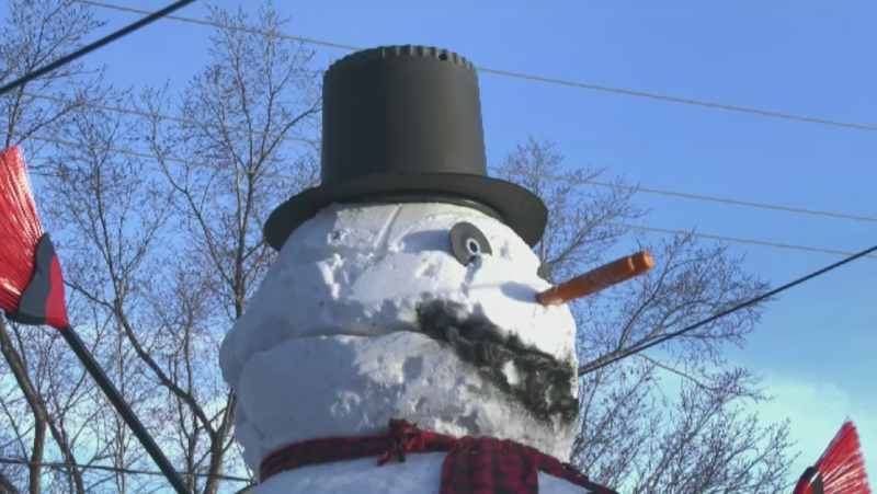 A massive snowman built by a Regina man in his yard. (Mick Favel/CTV News Regina)