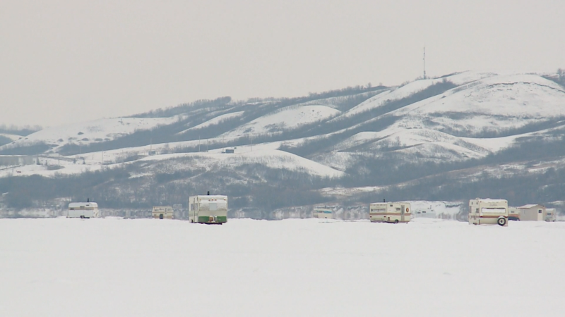 Ice fishing shacks are seen in this file image. 