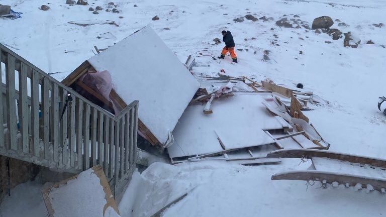 The aftermath of a blizzard in Pangnirtung, Nunavut, is shown in this recent handout photo. A Dec. 27 blizzard that saw winds reach 135 kilometres per hour tore apart cabins and ripped windshields from snowmobiles in Pangnirtung. One person was flown to a southern hospital with injuries. THE CANADIAN PRESS/HO - Sky Panipak
