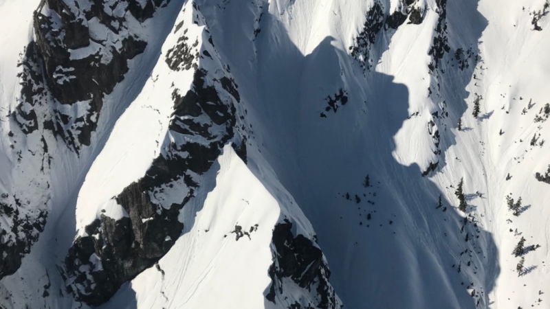 File image: Cracks can be seen in the surface of the snow on Crown Mountain during a period of high avalanche risk on March 18, 2019. 