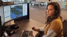 E-Comm call taker Megan McMath is pictured at a call centre on Vancouver Island: (E-Comm)