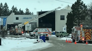 Emergency crews attend a fire at the Rochling Engineering Plastics plant in Orangeville, Ont., on Wed., Dec. 30, 2020. (Dave Sullivan/CTV News)