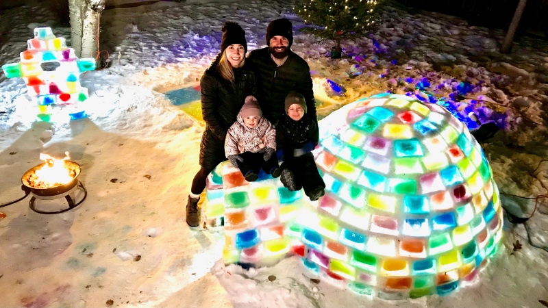 The Gamblin family with their colourful backyard igloo. Dec. 30, 2020. (Sean Amato/CTV News Edmonton)