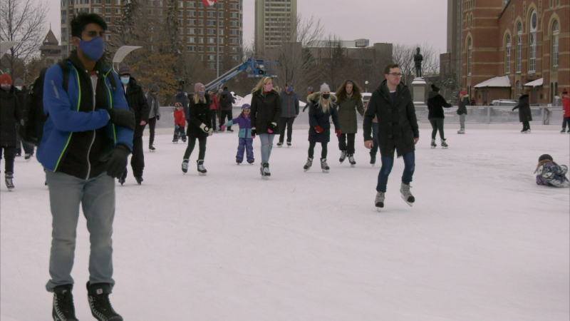 Skaters on the Rink of Dreams at Ottawa City Hall on Sunday, Jan. 3, 2021. (Shaun Vardon / CTV News Ottawa)