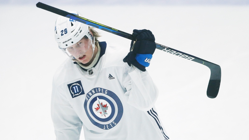 Winnipeg Jets' Patrik Laine (29) skates during the first day of their NHL training camp in Winnipeg, Monday, January 4, 2021. THE CANADIAN PRESS/John Woods