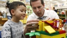 Ontario Premier Dalton McGuinty plays Lego with a kindergarten student at Roden Public School in Toronto, on Tuesday, Oct. 27, 2009. (Nathan Denette / THE CANADIAN PRESS)   