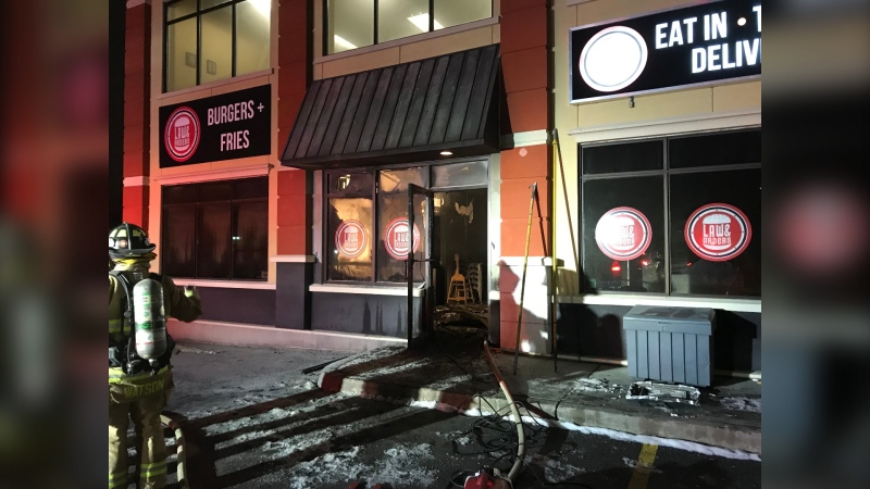 Ottawa firefighters at the scene of a fire at a restaurant on Terence Matthews Crescent in Kanata, Jan. 6, 2021. (Photo courtesy of Ottawa Fire Services)
