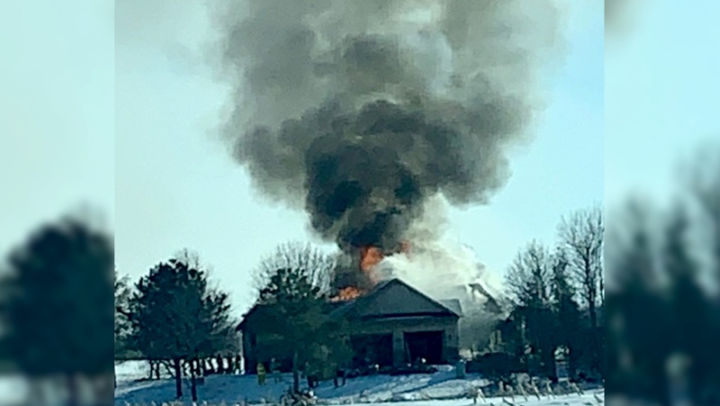 Fire at a home on Whys Line, east of Bayfield on Thursday, Jan. 7, 2021 (Source: Evan Gibson)