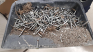 Nails allegedly found outside of Harvest Bible Church on Sunday, January 10, 2021 (Source: Aaron Rock)