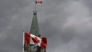 Stormy clouds move in over the Peace Tower on Parliament Hill, Sunday Sept. 13, 2009. (The Canadian Press/Adrian Wyld)