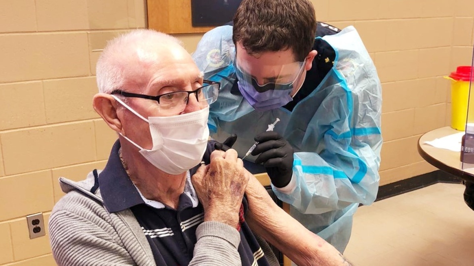 Senior Earl Morrison, receives PfizeCOVID vaccine 