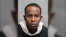 Toronto police are searching for Mohamed Wehelie, 35, on a number of charges including forcible confinement and threatening death. (TPS)