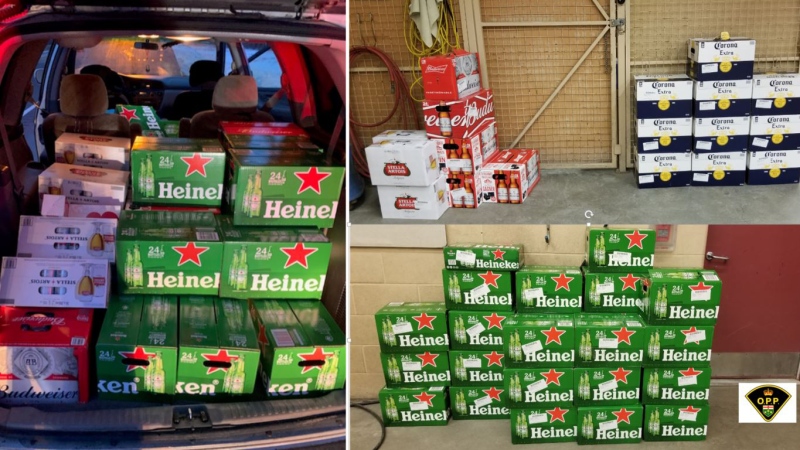 Police stopped a driver who was transporting 58 cases of beer on Highway 401 Wednesday. (OPP photo)