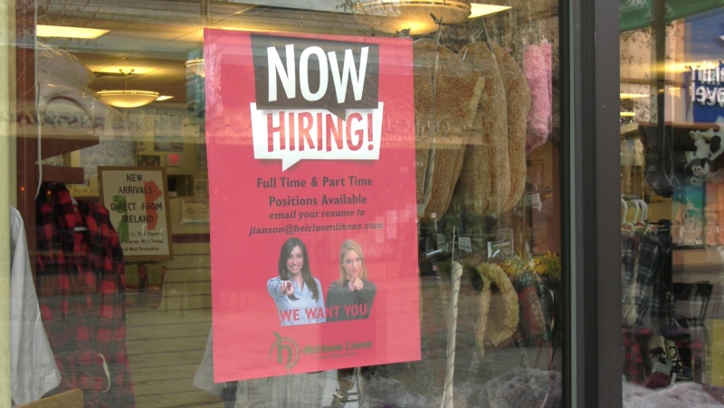 A 'Now Hiring' sign is posted outside of Heirloom Linens in Broadmead Village: (CTV News)