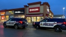Officers respond to an armed robbery at a Cambridge business (Terry Kelly / CTV News Kitchener)
