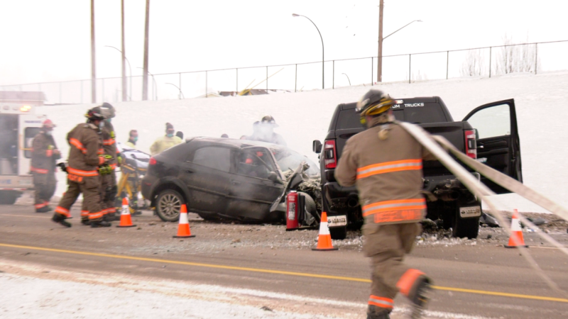 A firefighter on scene at a head-on crash on Circle Drive on Jan. 15, 2021. (Chad Hills/CTV News)
