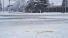 Police tape lies across the ground in the area of Hunt Club Road and Lorry Greenberg Drive, Saturday, Jan. 16, 2021. Ottawa police are investigating the shooting death of a man in this area. It's the first reported homicide of the year in Ottawa. (Mike Mersereau / CTV News Ottawa)
