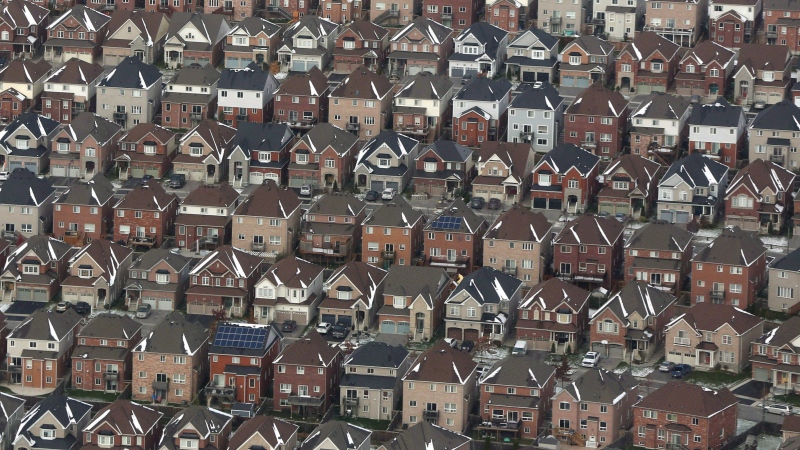Aerial view of houses in Oshawa, Ont., seen from a Canadian forces Hercules on Saturday, Nov. 11, 2017. THE CANADIAN PRESS/Lars Hagberg