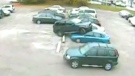 A surveillance camera captured this scene in the parking lot of Extreme Fitness in Thornhill, Ont. on Oct. 22, 2009.